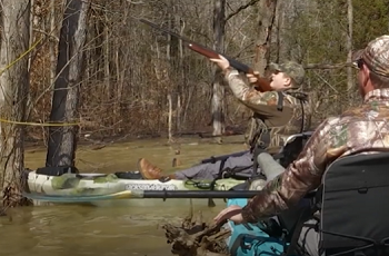 What safety precaution should you take when hunting from a boat