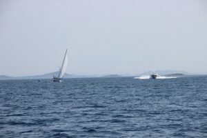 two powerboats are about to cross paths