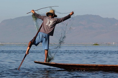 The fisherman lost his balance